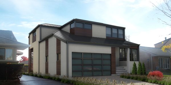 Modern two-story house with large glass garage door and minimalist design.