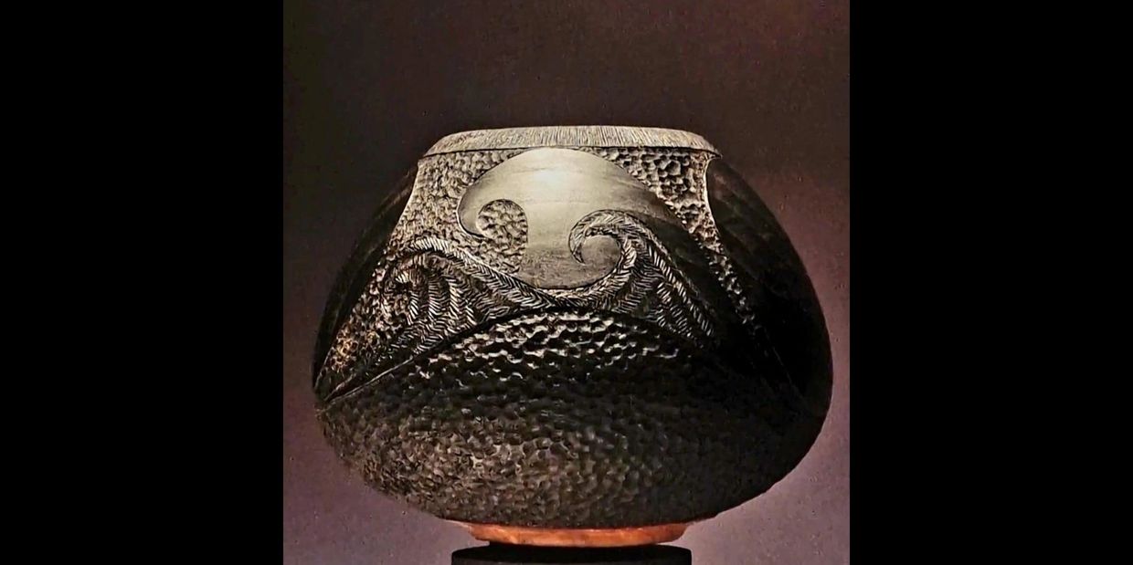 Ebonised Irish Ash, greenwood vessel turned and hand carved by Ruairi Dennison Sculptor Carver