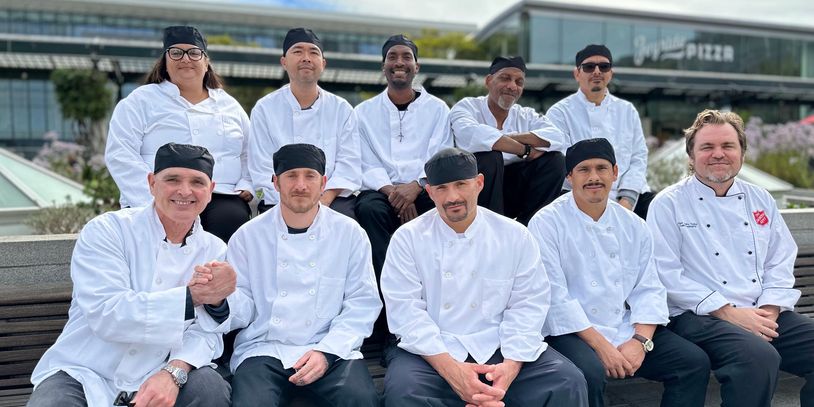 Chef Timothy posing with the Fall 2023 cohort of the CTA.