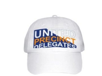 White cap with bold text reading 'UNITED PRECINCT DELEGATES'.