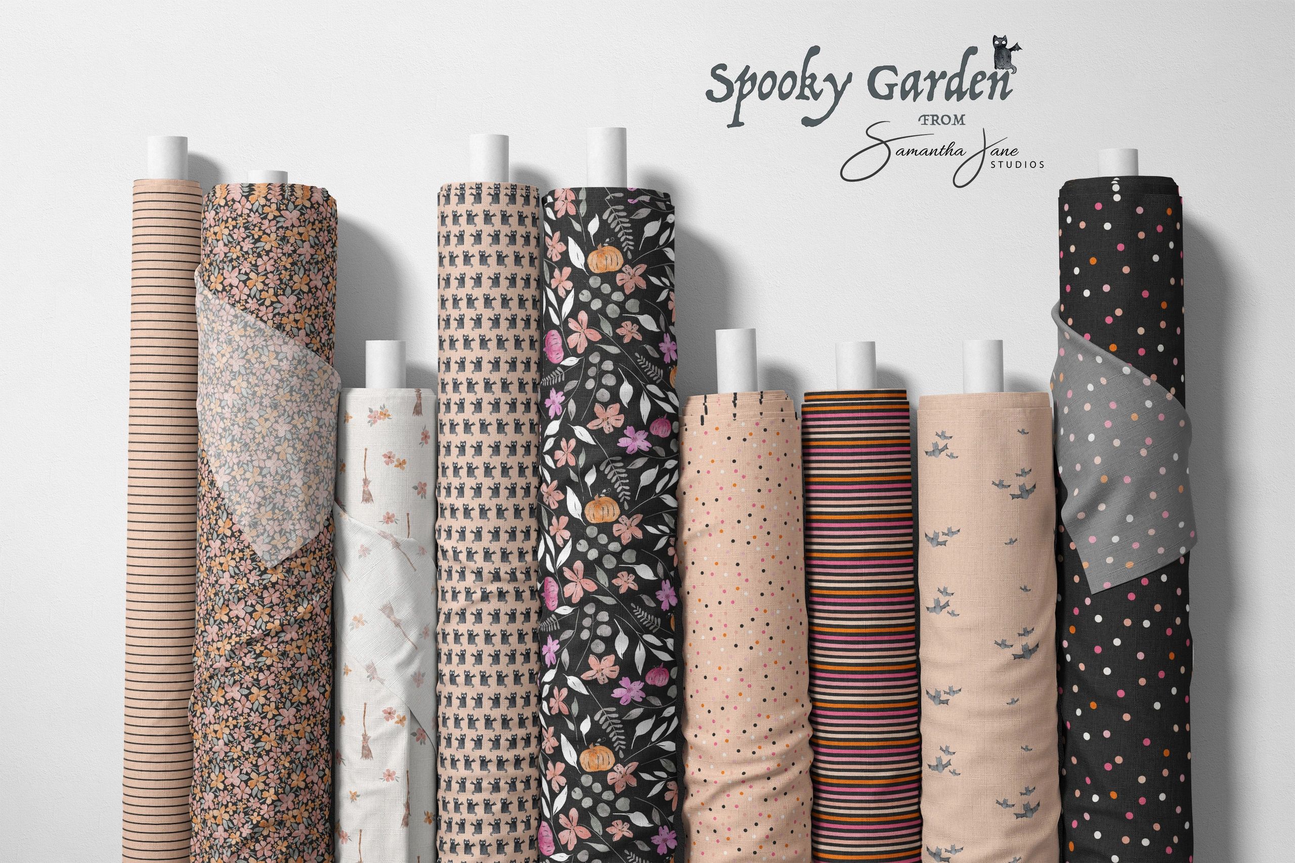 Fabric rolls showing halloween seamless patterns 