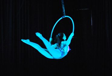Photo by Elsie Smith
Erika Valles on aerial hoop/ lyra in unique alien costume arching her back