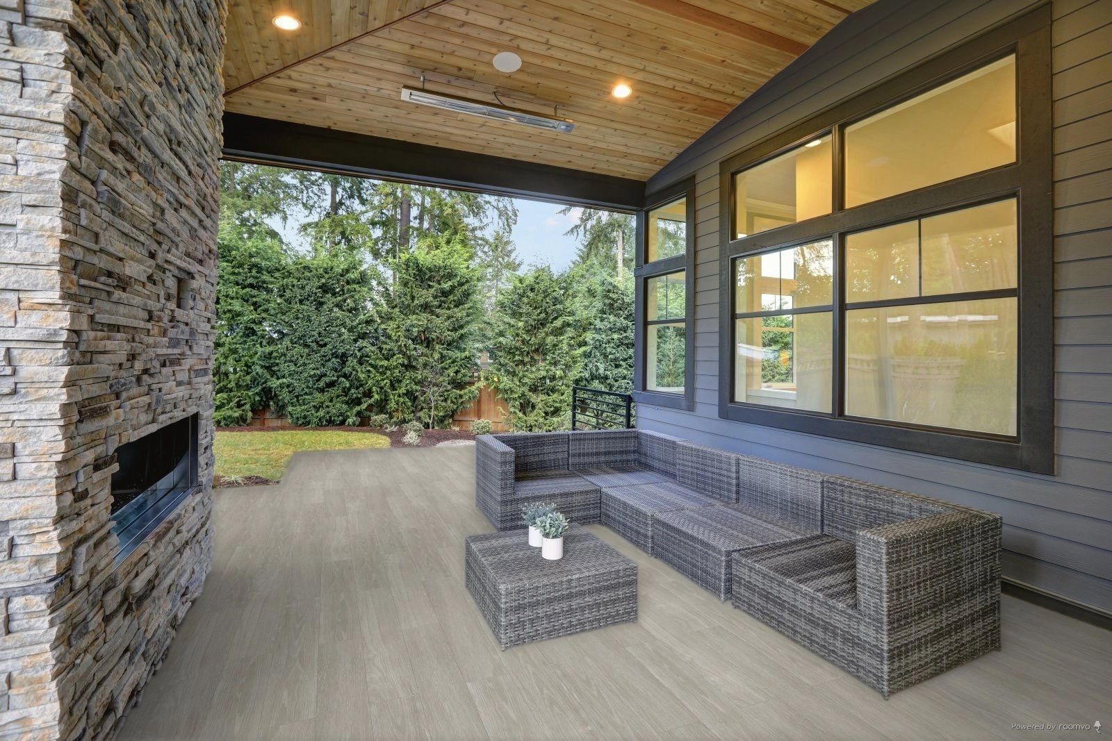 Blendwood Fumo wood look tile 8in by 48in porcelain rectified tile with grey tones on patio space