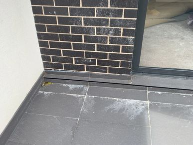 A new home with building defects causing water leaks, non compliant works and building damages