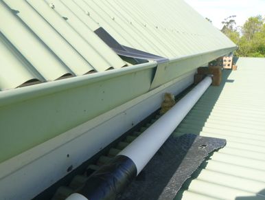 A repaired roof after a water leak that has not been completed to comply with building codes. 