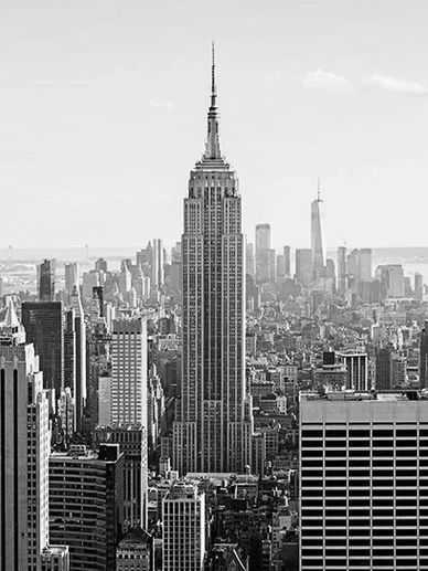 Black and white photo of the Empire State Building in New York City.