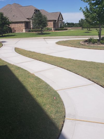 Sidewalk in curing stage a few days after pour.