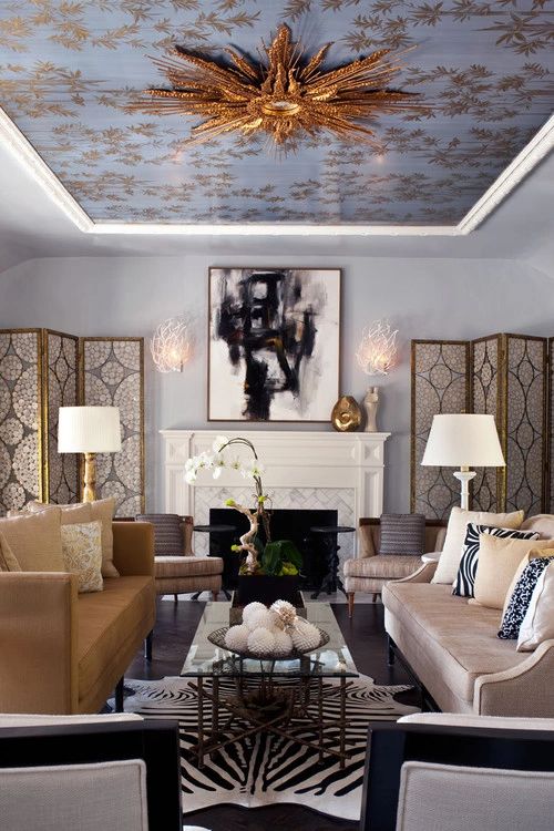 Elegantly designed sitting room with a decorative ceiling.