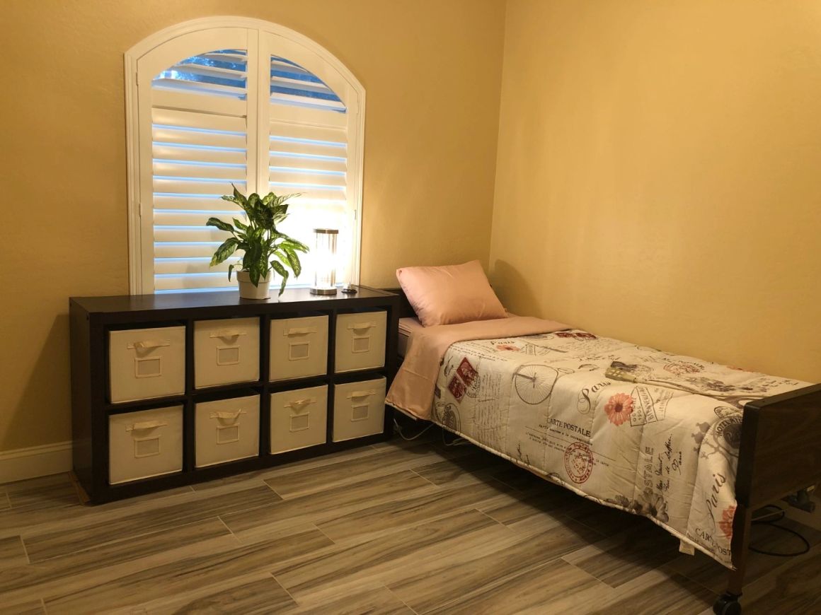 Bedroom shown at Marigold at Redwood Assisted Living Home.
