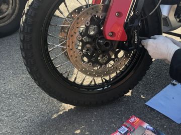 Changing the front brake pads on a motorcycle
