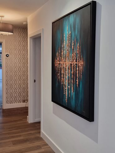 Framed portrait abstract art to match modern hallway entrance. Copper and bronze on turquoise green.
