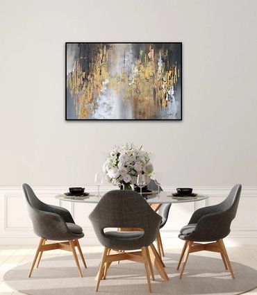 large portrait grey brown, copper and gold abstract artwork above dinning room table in modern home.