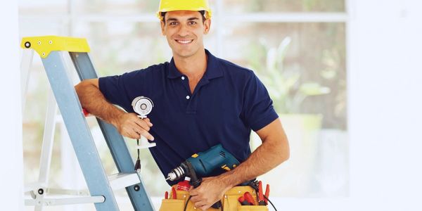 Service Technician installing a security camera