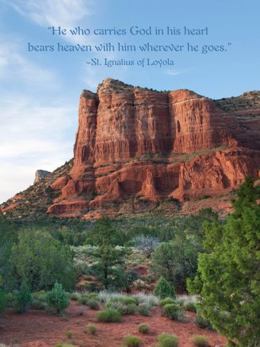 Quote on carrying God in the heart against a red rock mountain landscape.