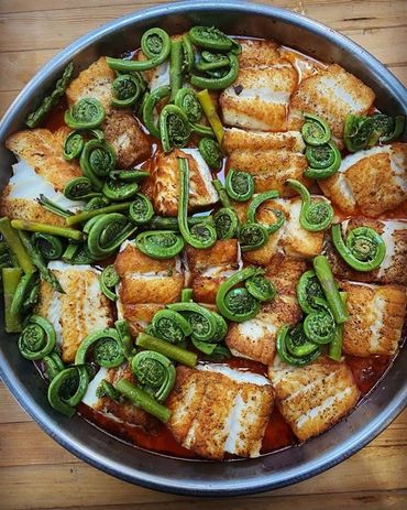 halibt fiddlehead spring dish neck of the woods tofino