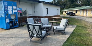 Outdoor seating & Ice vending machine at Sahara Club bar & grill in Copperhill, TN
