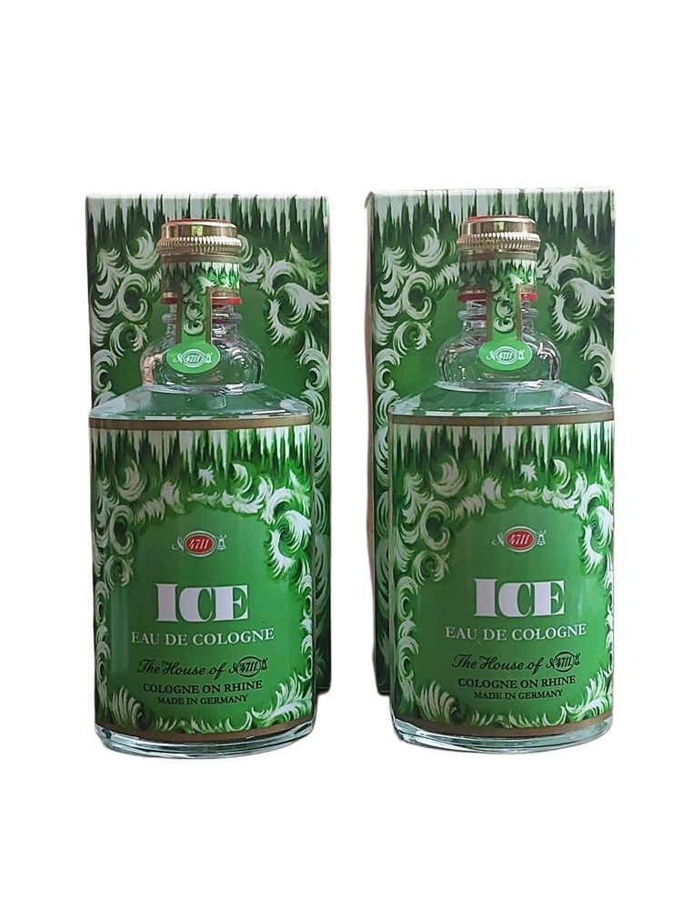Two green bottles of 4711 ICE Eau de Cologne with ornate designs.