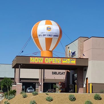 Grand Opening balloon. Outdoor Advertising. Now Open