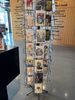 A display rack with various greeting cards in a store.