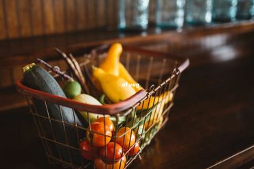 Seasonal vegetables in a wire basket