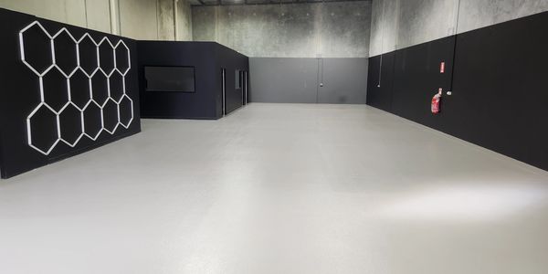 
Hard-wearing epoxy coating applied in this commercial space for a detailing company.
