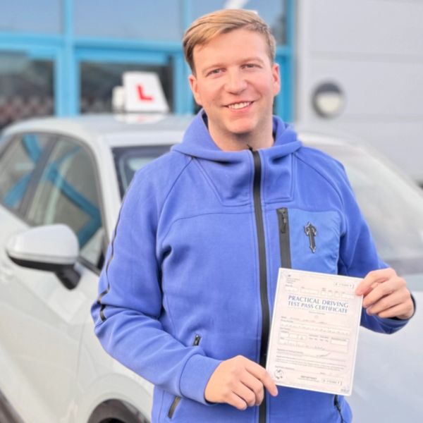 James passing his driving test. 