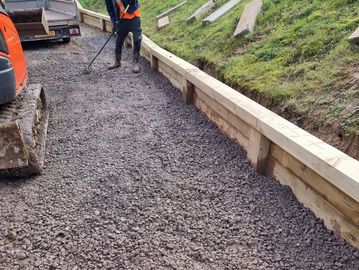 Raised sleeper bed and driveway.