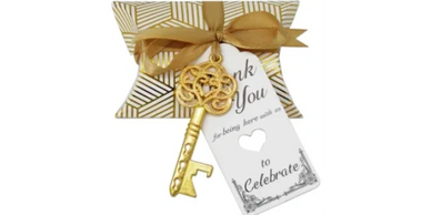 A scenic landscape with mountains, a lake, and a bright blue sky.