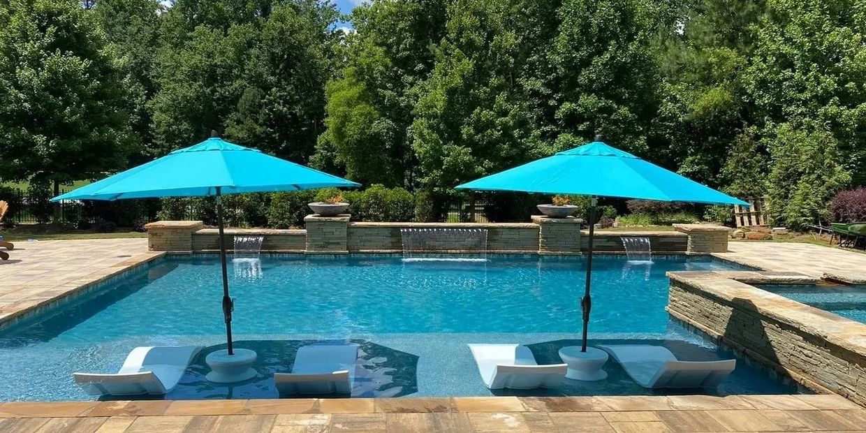 a beautiful pool by Custom Backyards 