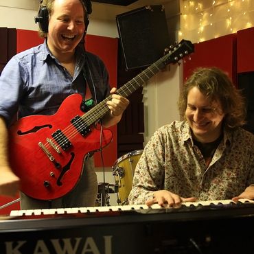 Colin Harper and Scott Flanigan goofing about at Late-Night Tony’s unnamed recording studio in 2018.