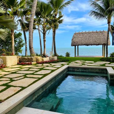 Custom stone pool and deck for "Grottos + Pools" category