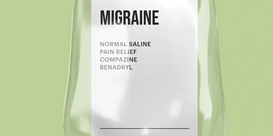 IV bag labeled for migraine treatment with saline and medications.