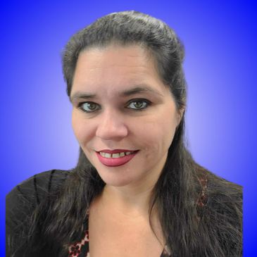 A woman smiling against a blue gradient background.