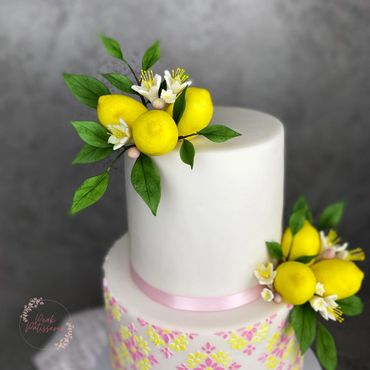 Close up of sugar lemons, flowers and foliage