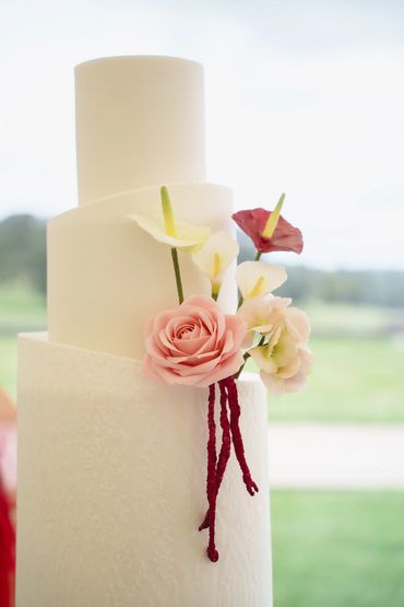 Close up of sugar flower details. Anthuriums, calls lilys, rose, hydrangea and amaranthus. 