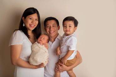 Happy family portrait with two children.