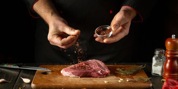 Chef using pre-prepped seasoning blend