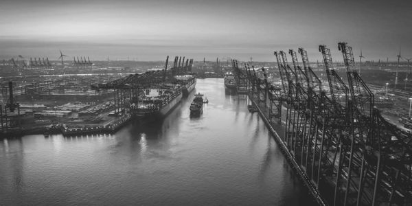 A corridor of commerce—where relics voyage and legacy anchors.