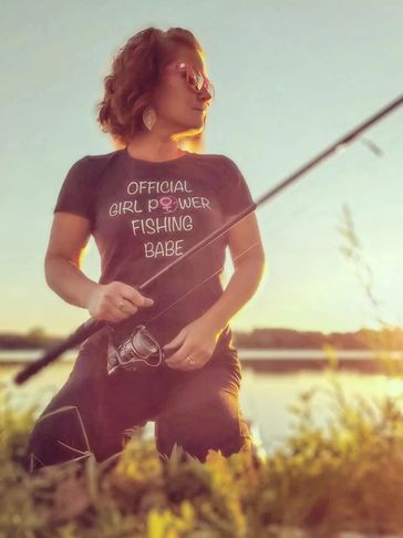 A woman wearing a Girl Power Fishing T-shirt