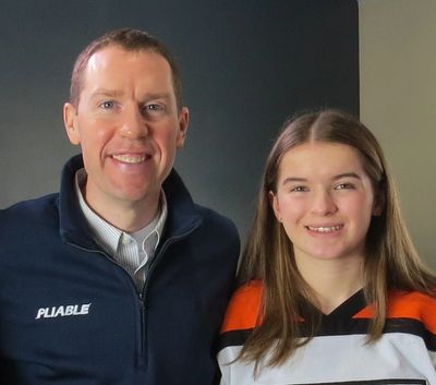 Athlete Brand Advisor & CEO of Pliable, Greg Glynn takes a photo with Pliable athlete Kaylyn Bourque