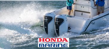 A boat with twin Honda 350 V8 outboard motors speeding through water.