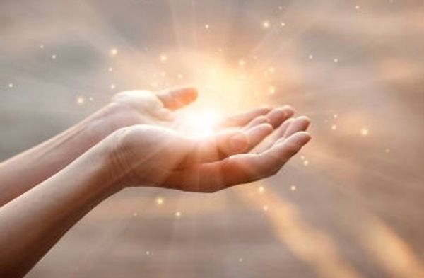 Woman hands praying for blessing from god on sunset background