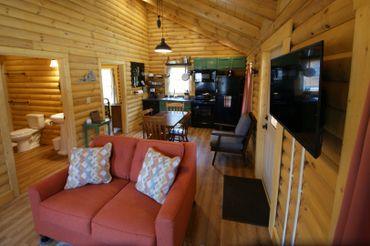 Full interior shot of log cabin.