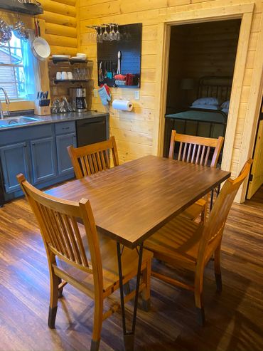 Dining room table with 4 chairs.