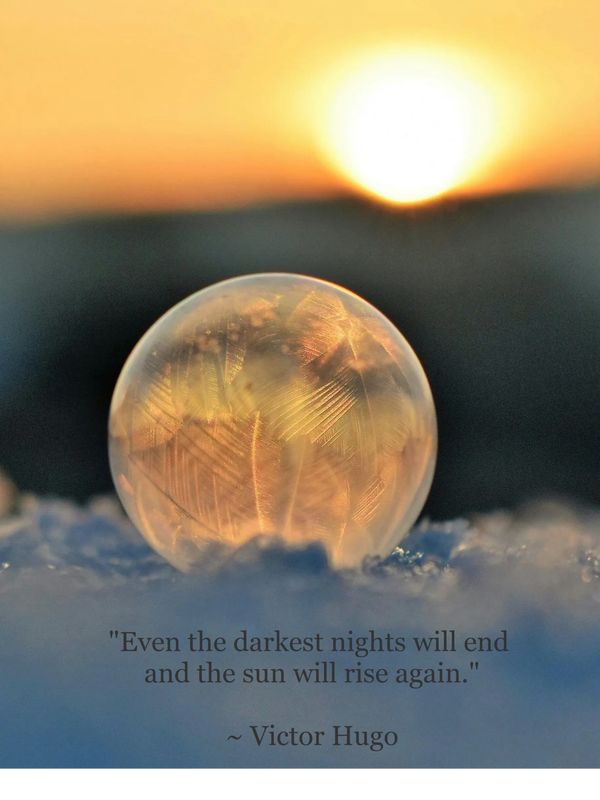 A frozen bubble at sunrise with a Victor Hugo quote on hope.