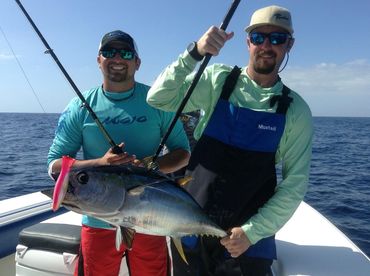 Two anglers out at sea