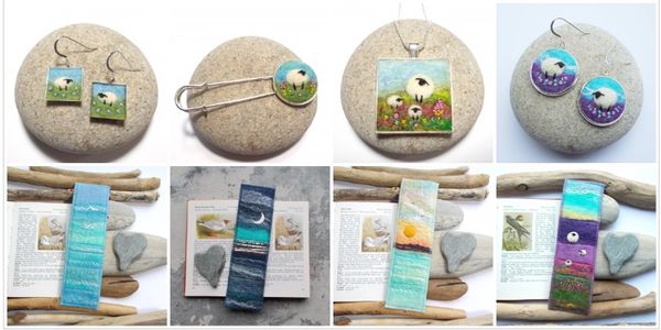felt sheep earrings, necklace and shawl pin above a row of handmade seascape and sheep bookmarks 