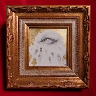 Eye drawing, lover’s eye, gold frame, framed art, jewel, realism, imaginative realism. 