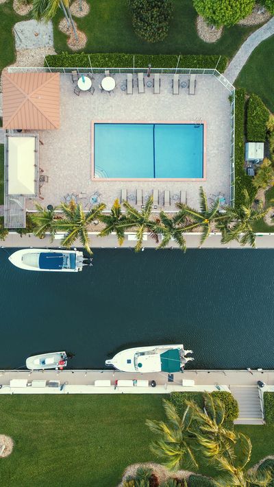 a pool situated near a key largo condominium association marina