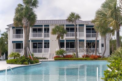 Condo in Islamorada with a pool, palm trees, managed by Harbor Management Services, Inc.